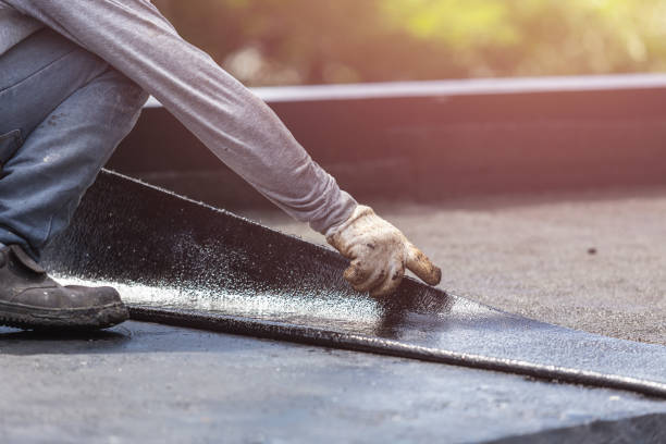 Professional Basement Waterproofing technician working in Afton, TN